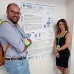 Mario Milazzo and Norma Mallegni in front of the FURIOUS poster